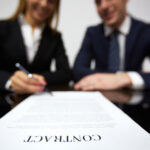 businesswoman signing new contract
