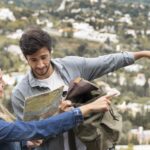 medium shot couple with map